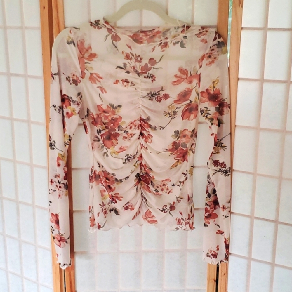 Cream and floral see through top